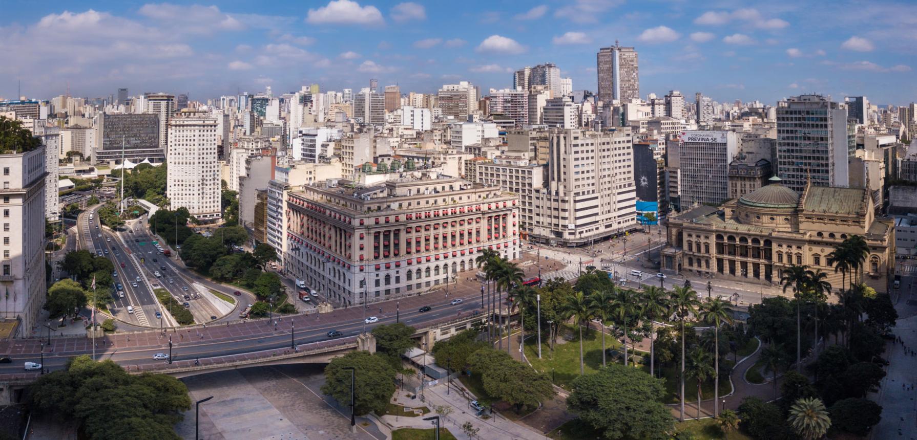 Beautiful aerial drone view of Anhangabau Valley square, viaduto do cha and classic buildings of Sao Paulo city skyline in summer sunny day. Concept of architecture, urban, metropolis.